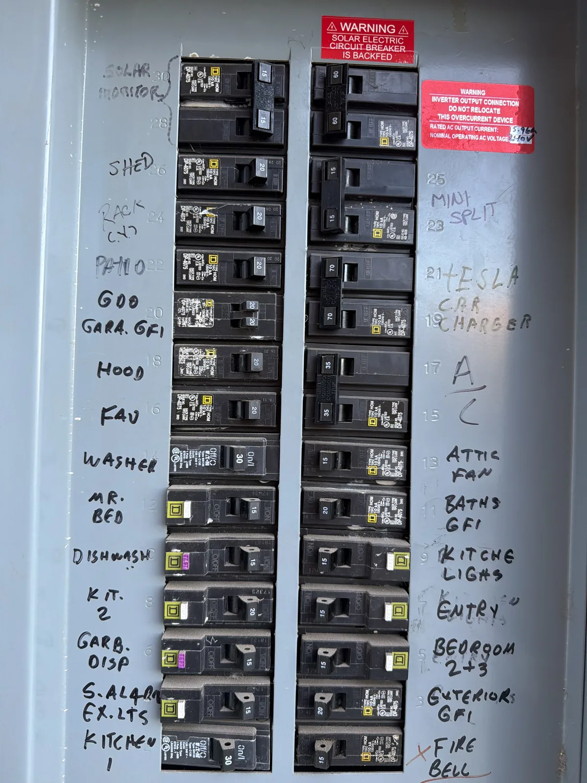 Home breaker panel with the Tesla car charger circuit on a 70 amp breaker