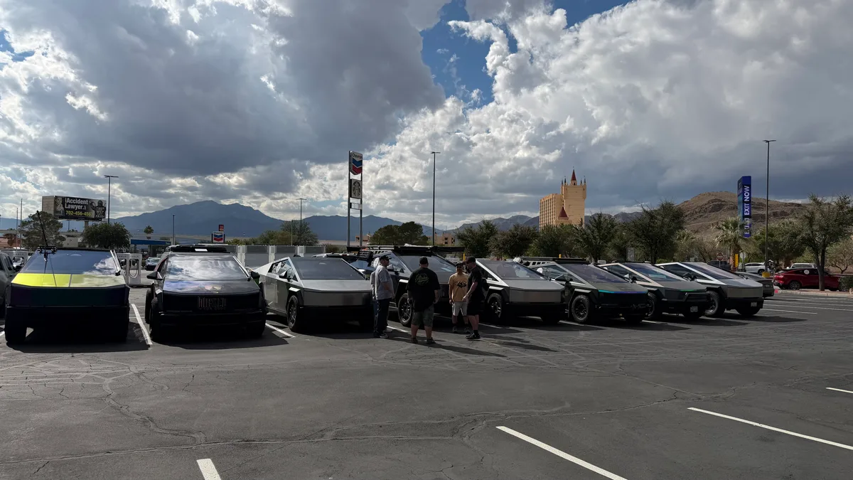 Cybertruck group meetup at State Line in Primm with desert mountains in the background during the Zero Emissions Run Las Vegas