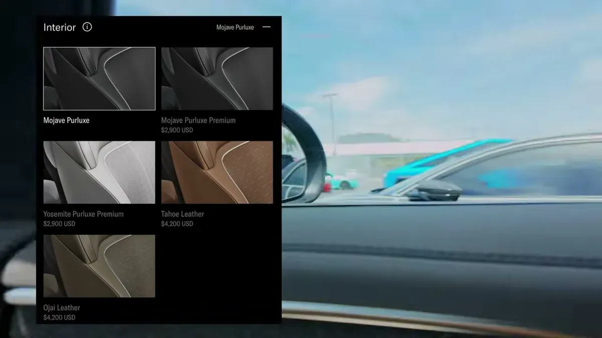 Lucid Gravity interior display showing upholstery trim options including Mojave Purluxe and Tahoe Leather.