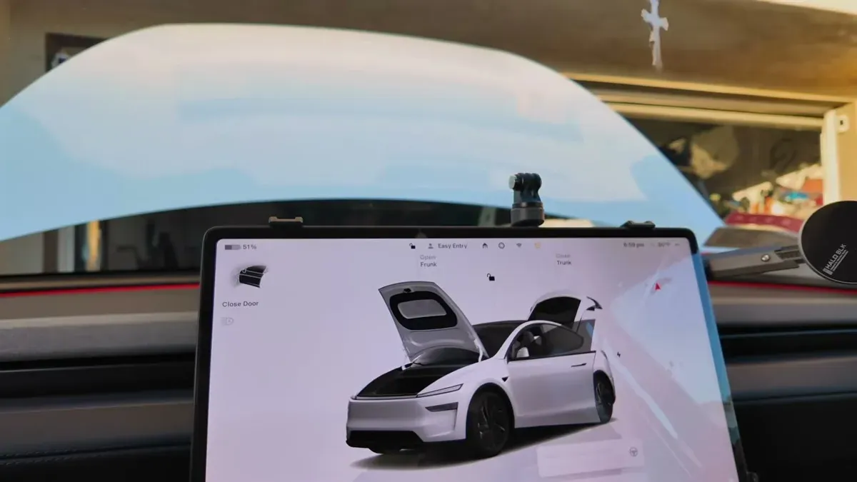 Close-up of the HaloBlk Halo Station mounted around the Model Y Juniper infotainment screen