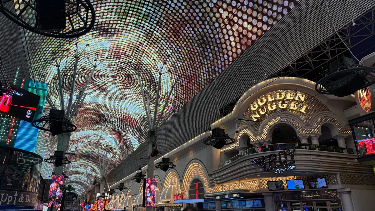 Wide angle view of the Fremont Street Experience LED canopy light show above the Golden Nugget