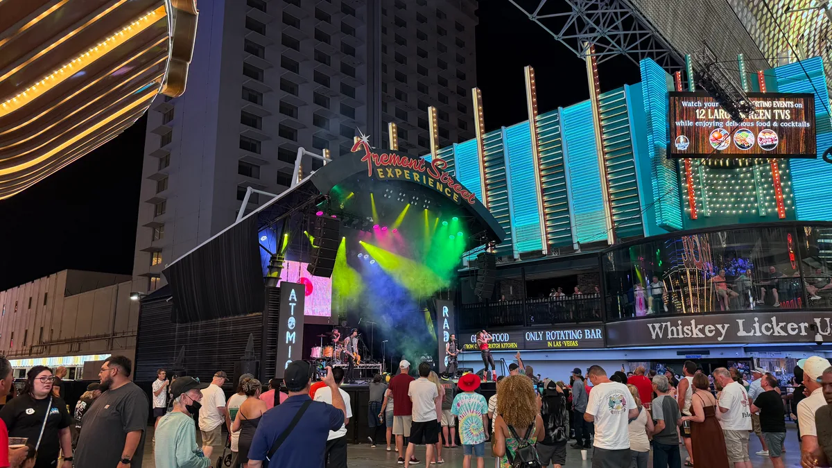 Live band performing on stage at the Fremont Street Experience in Las Vegas at night