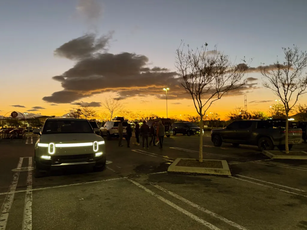 Group of Rivian owners gathering before a trip