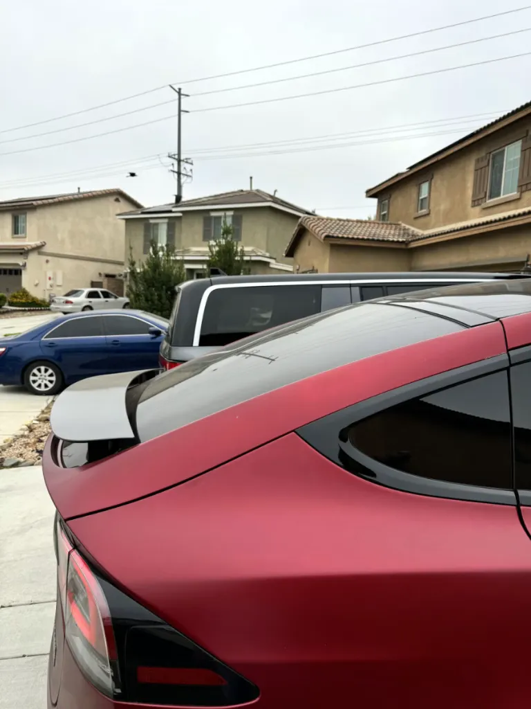 Comparing the rear exterior of Rivian R1S and Tesla Model X