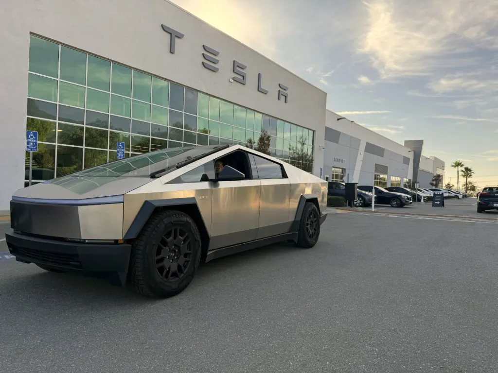 Cybertruck parked in front of Tesla