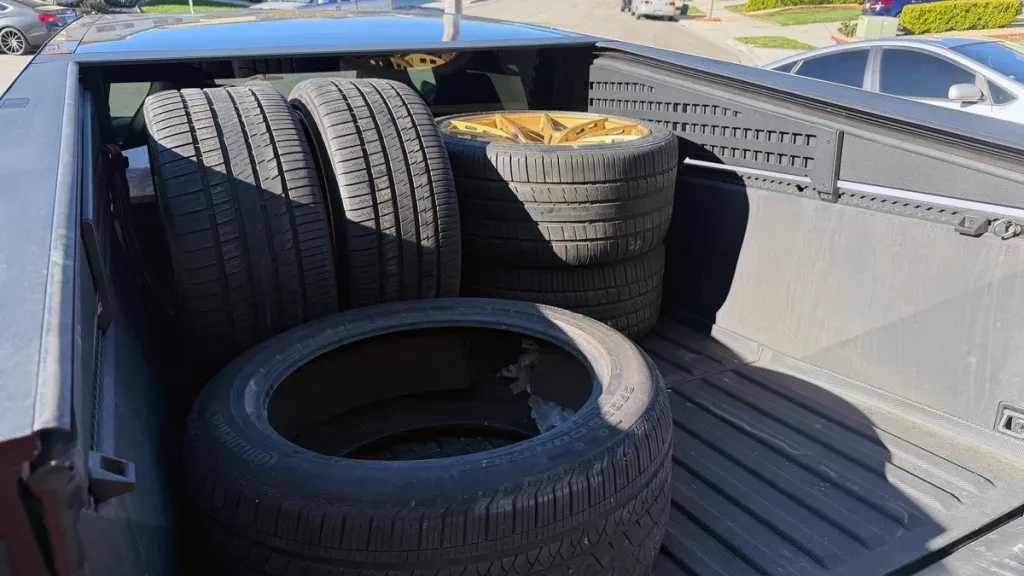 Wheels and tires on the back of a Cybertruck
