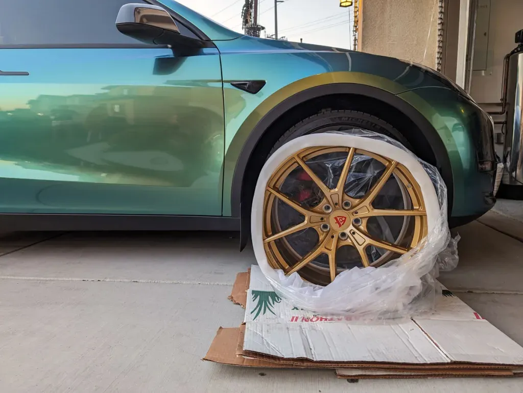 RVRN MB373 on the side of Model Y Performance