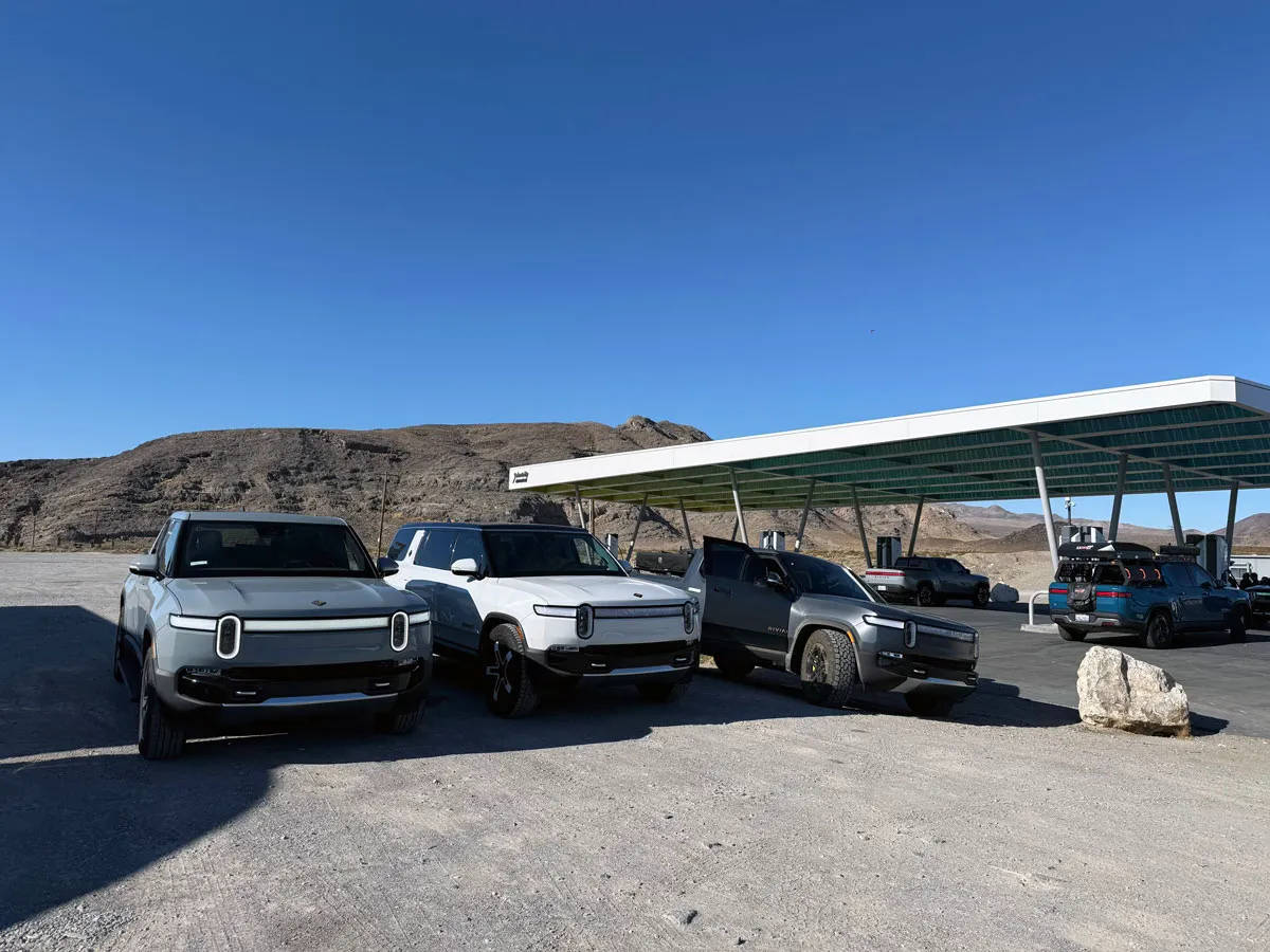 Electrify America charging station with Rivian vehicles