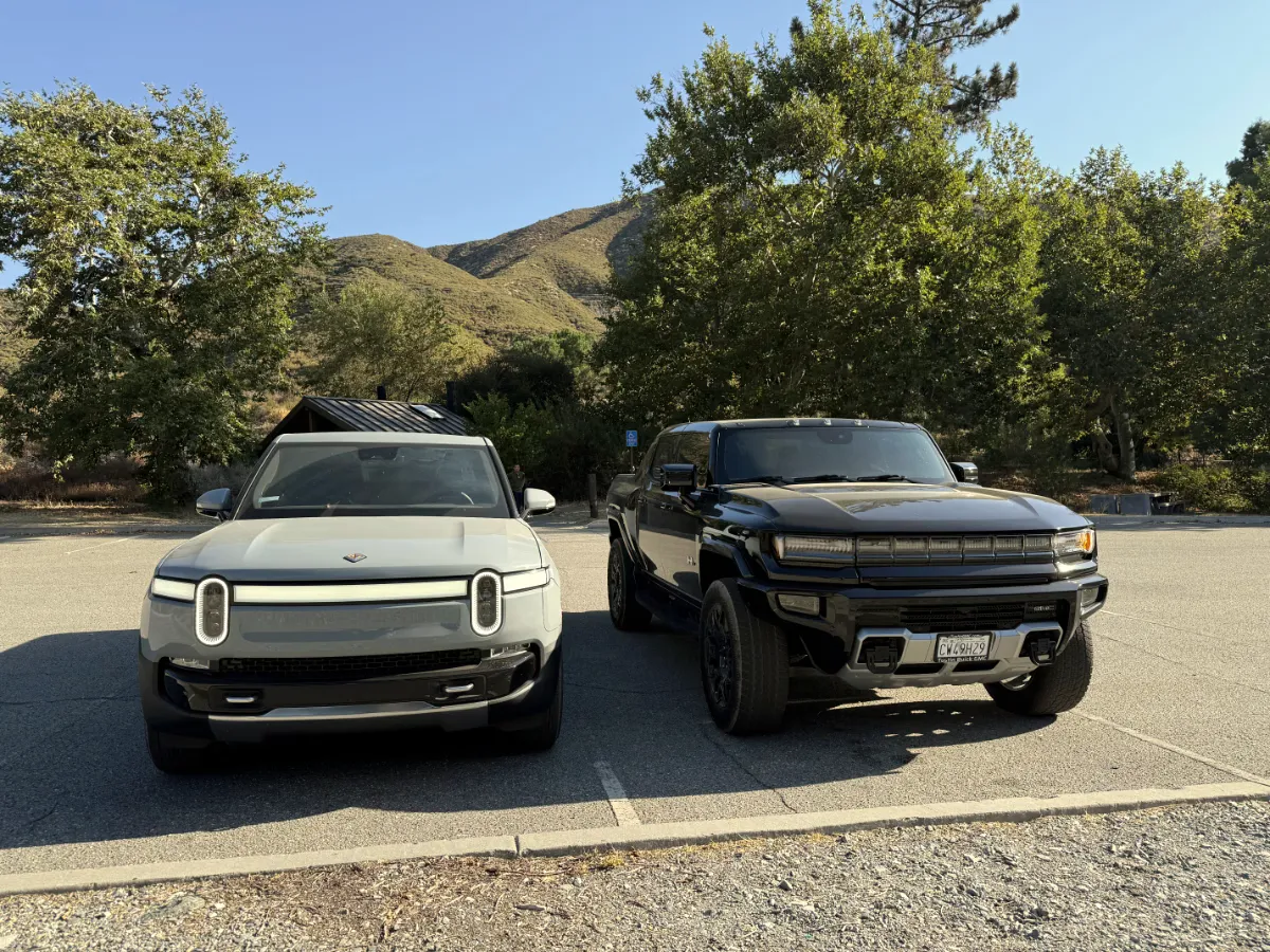 front side of Rivian R1T and Hummer EV
