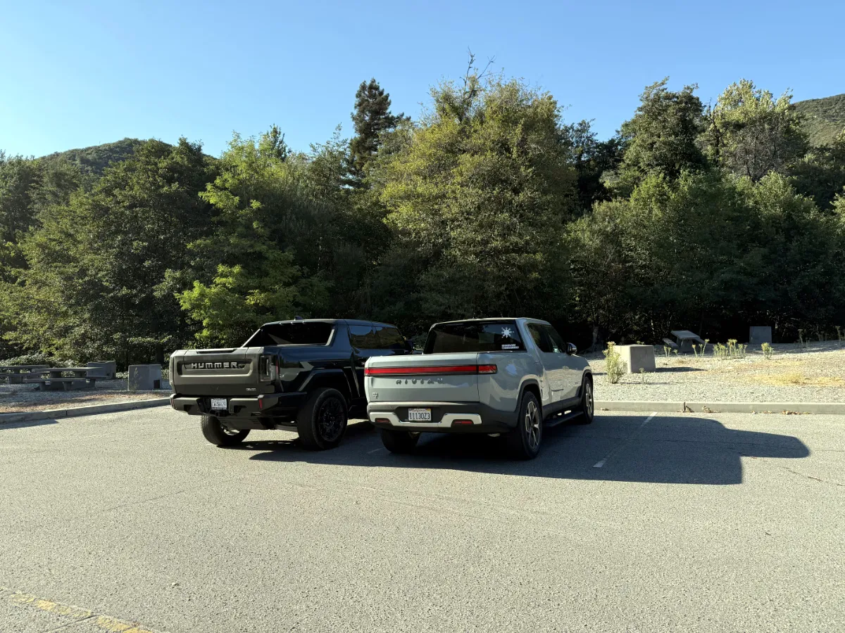 Rear of Rivian R1T and Hummer EV