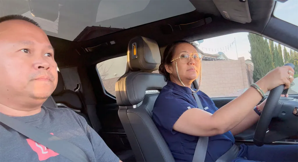 Woman driving Rivian R1T