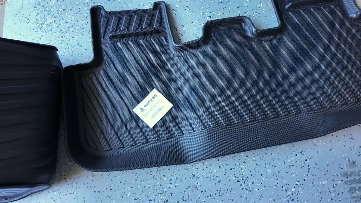 Overhead view of Jowua rear floor mats installed in Tesla Model Y Juniper.