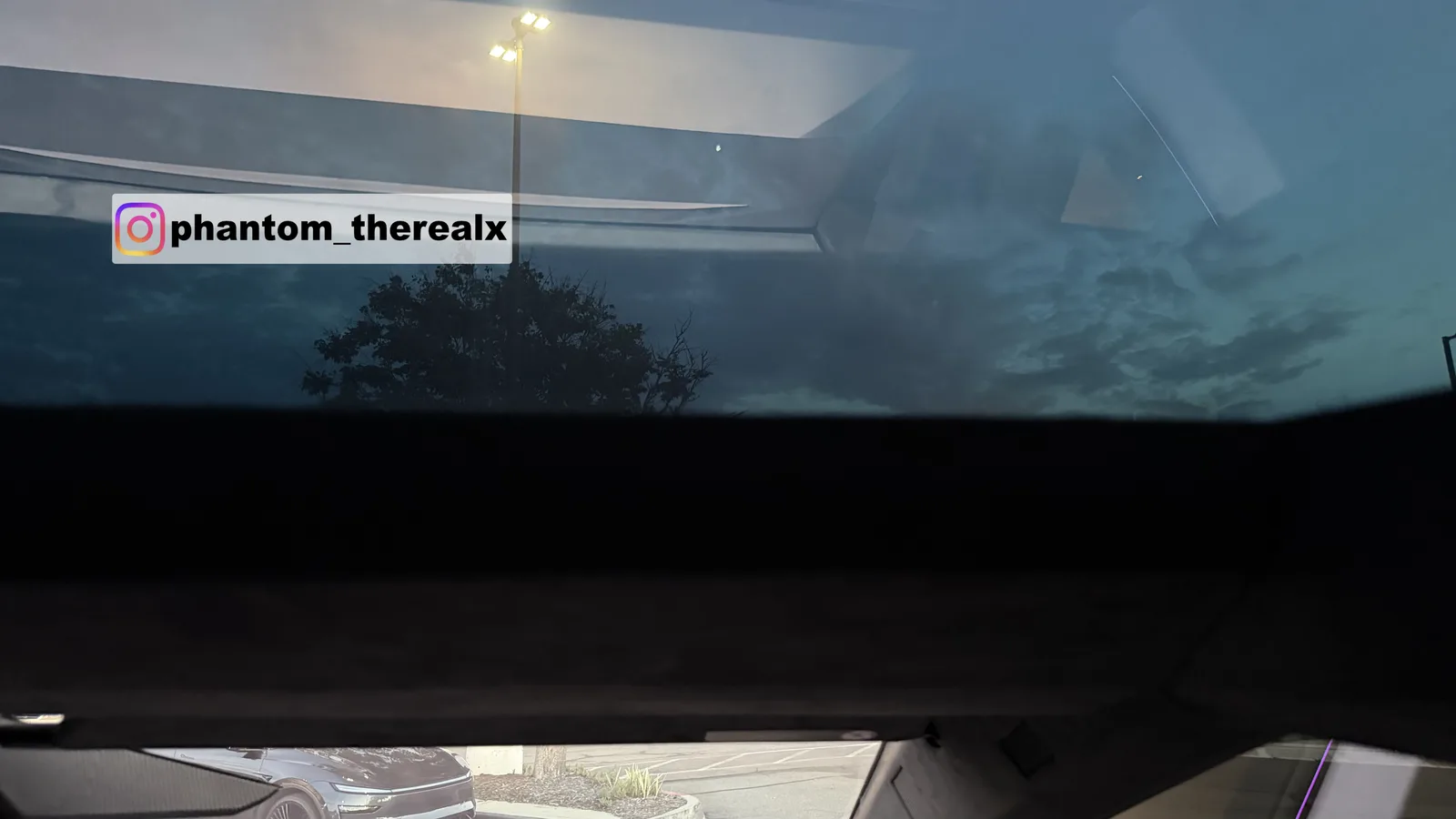 Front headliner of phantom_therealx's Cybertruck sitting flush against the windshield.