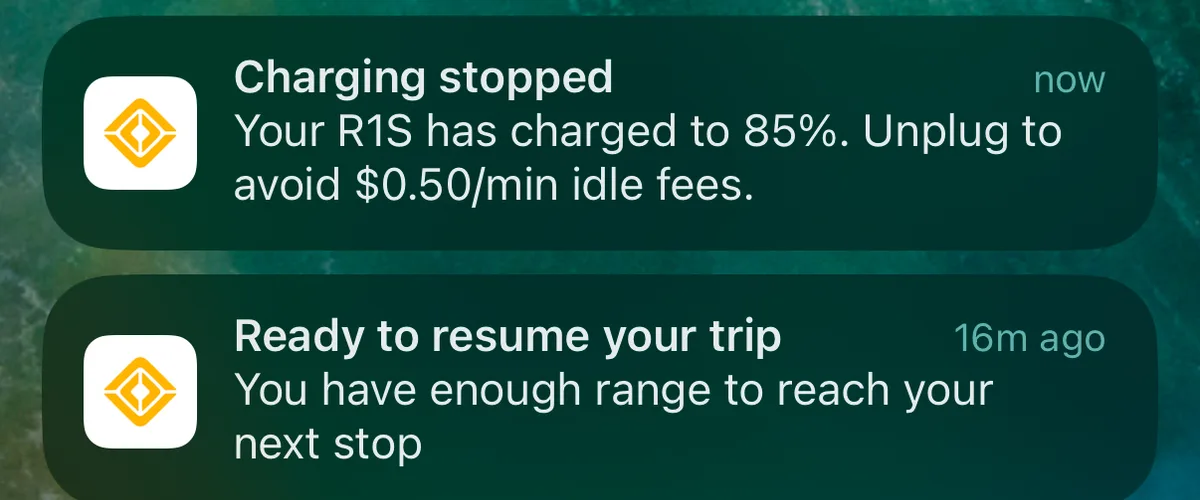 Rivian app notification showing charging stopped at 85% with idle fee warning
