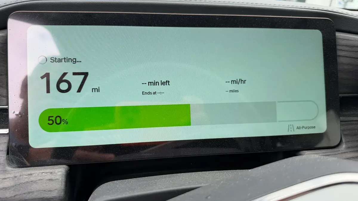 Rivian R1S charging screen at the Ventura Rivian Adventure Network site showing 50 percent charge and 167 miles of range as charging starts