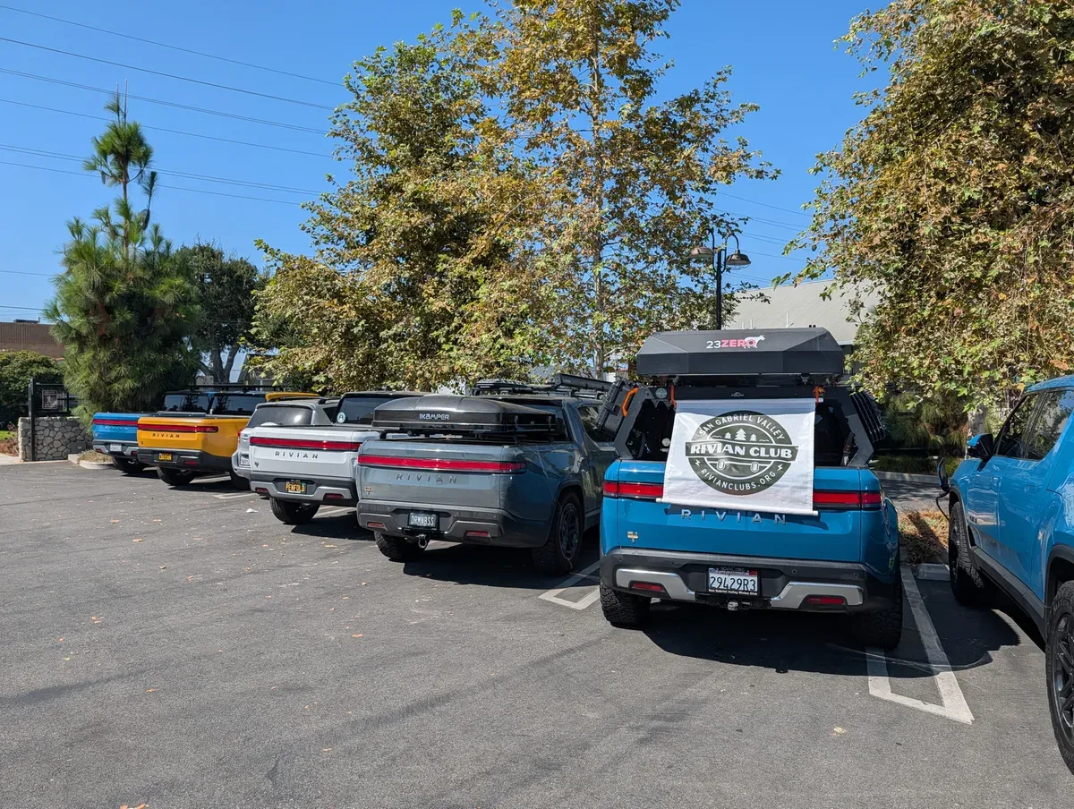 San Gabriel Valley Rivian Club lineup of R1T and R1S with rooftop tents