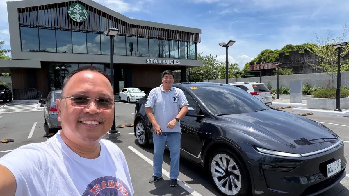 Selfie with Doc Dennis and his Stealth Gray Tesla Model Y outside a Starbucks in Santa Cruz, Laguna
