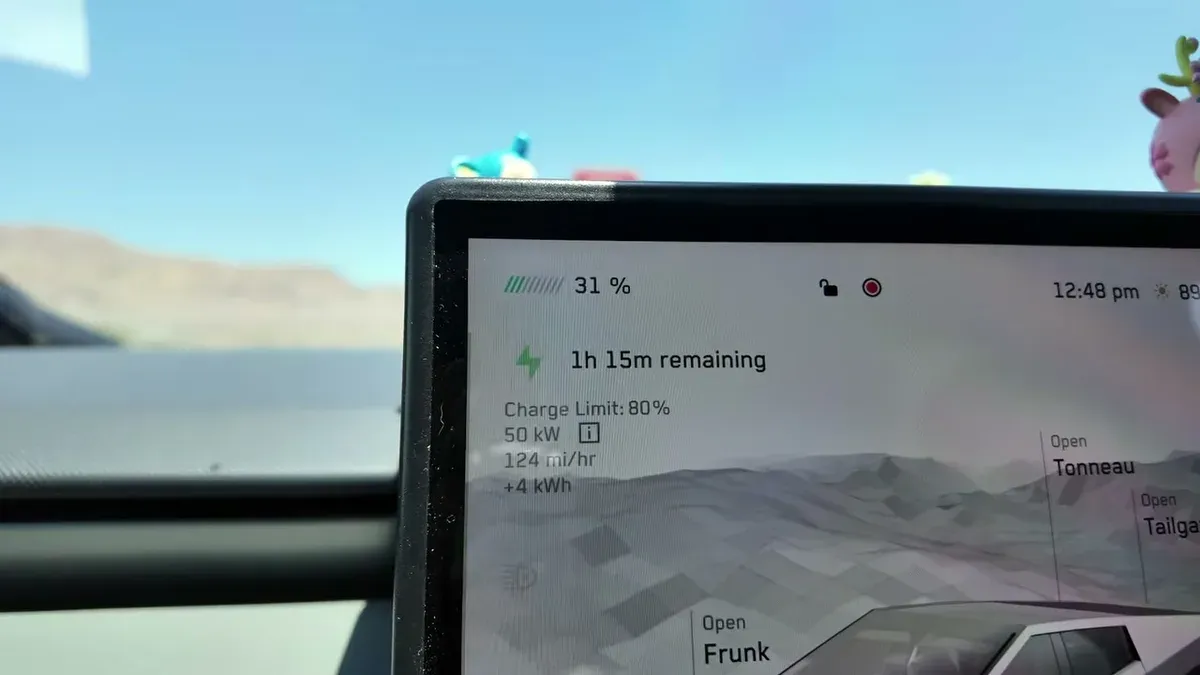Tesla Cybertruck charging screen showing 31% at 50 kW in Yermo