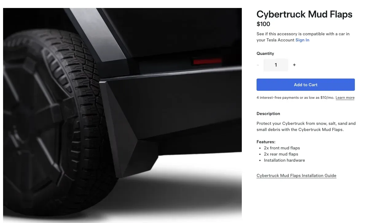 Official Tesla Cybertruck mud flap installed on the vehicle, showing texture and fit against the exoskeleton.