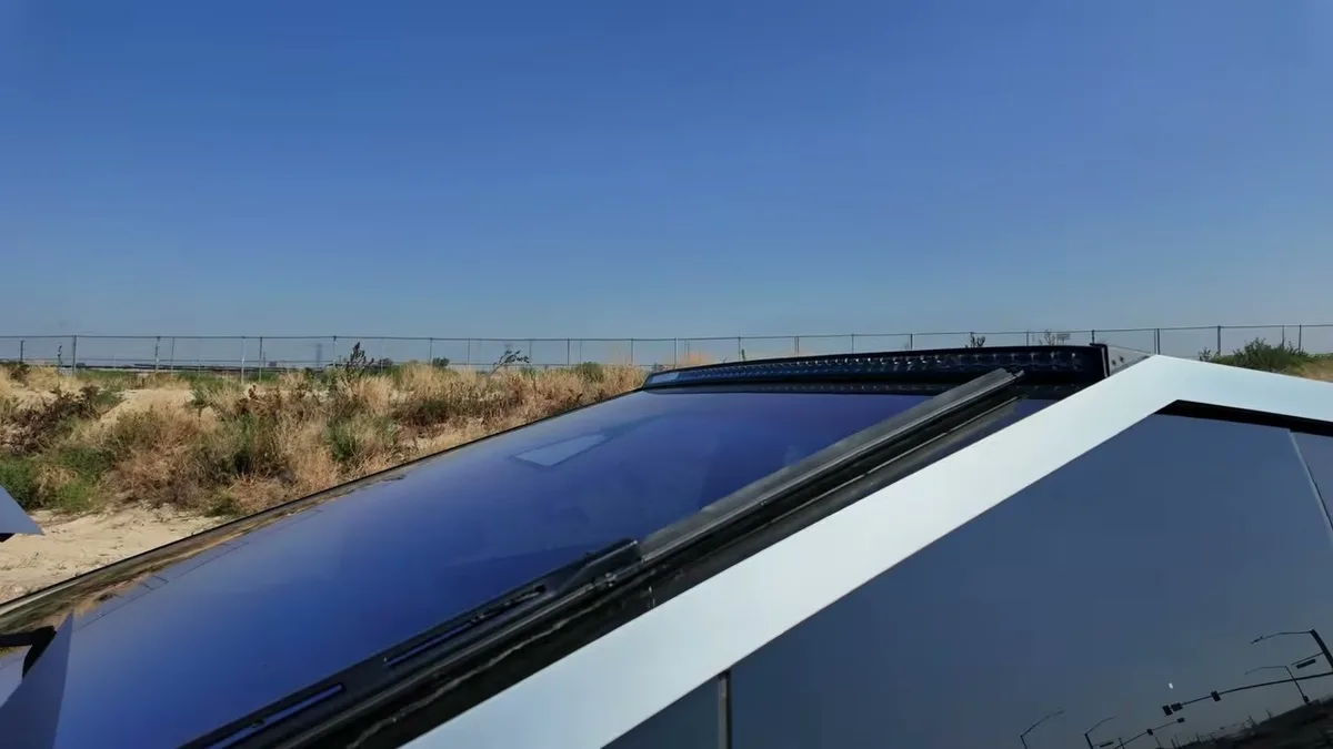 Tesla OEM light bar mounted on the Cybertruck roof, close-up