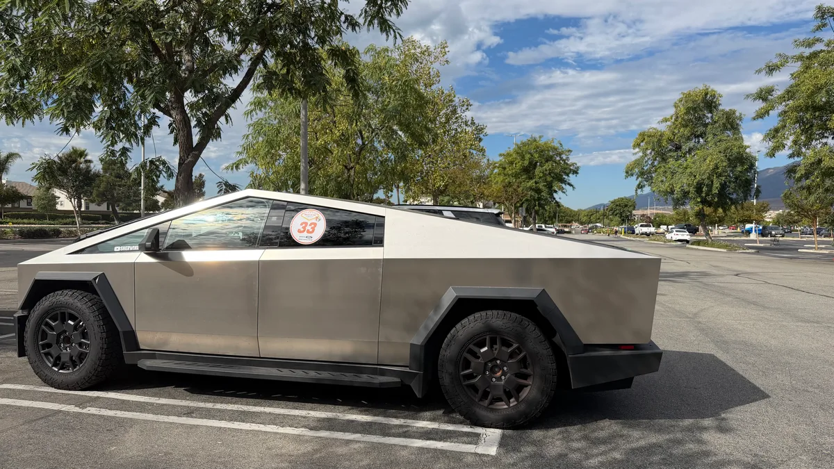Tesla Cybertruck with number 33 rally decal in the staging area parking lot for Zero Emissions Run Las Vegas