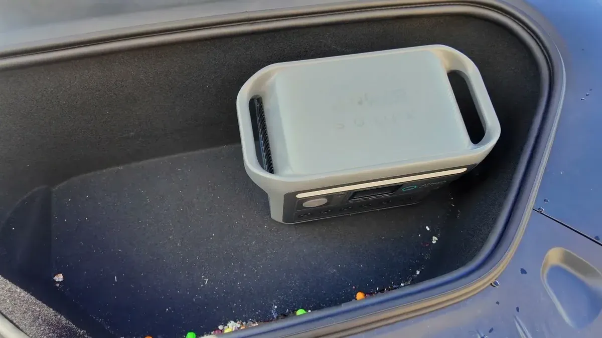 Anker Solix portable power station placed inside the 2026 Tesla Model S frunk to test storage capacity.