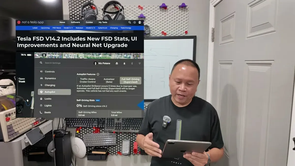Holding a tablet showing Tesla FSD v14.2 usage tracking stats