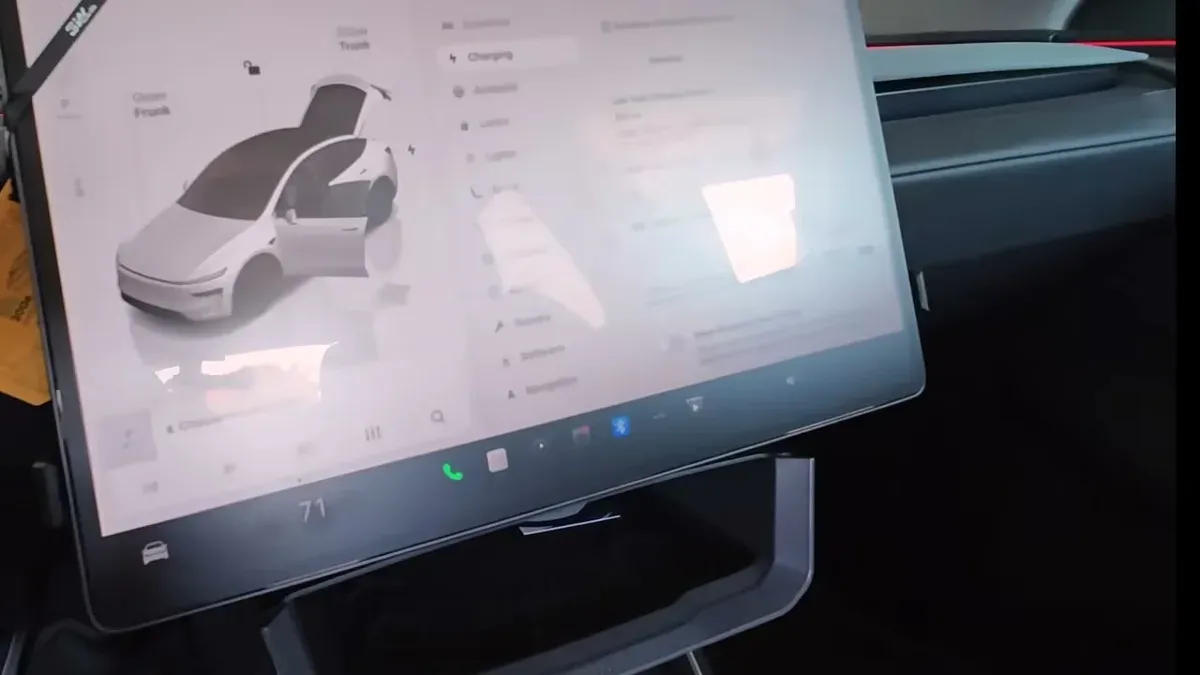 Tesla Model Y infotainment screen showing the Keep Accessory Power On toggle in charging settings