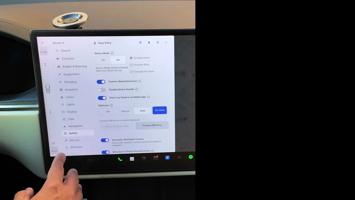 Tesla Model X safety and dashcam menu showing format for Steam option on the touchscreen