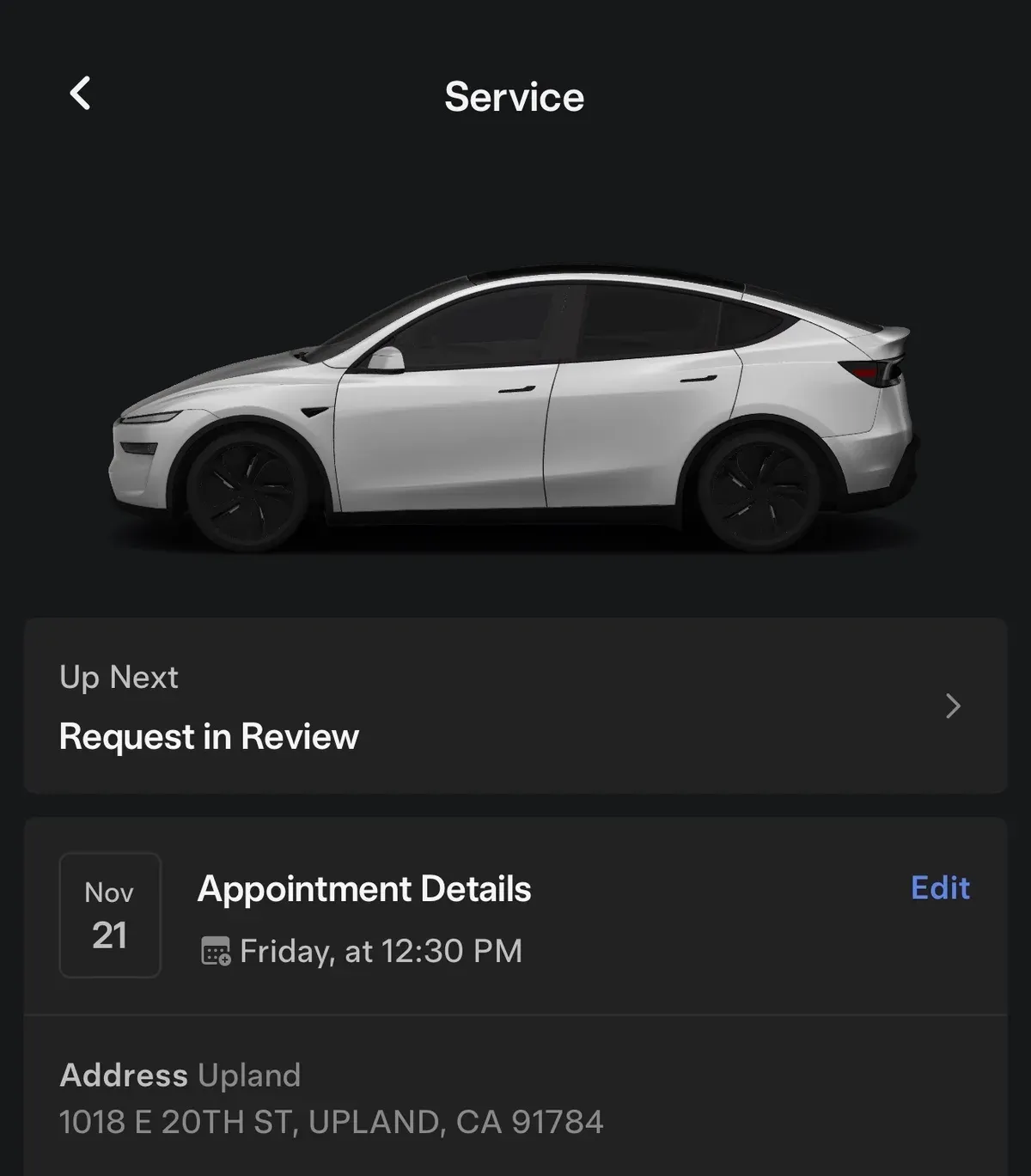 Tesla Model Y infotainment screen showing upcoming service appointment in Upland, CA