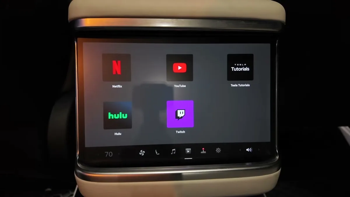 Tesla Model X rear screen showing the arcade and streaming app options