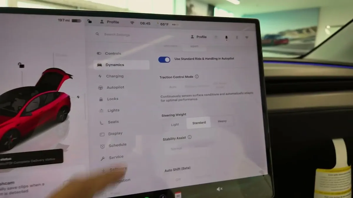Tesla Model Y Performance touchscreen showing Dynamics settings including Insane Mode and Standard ride handling