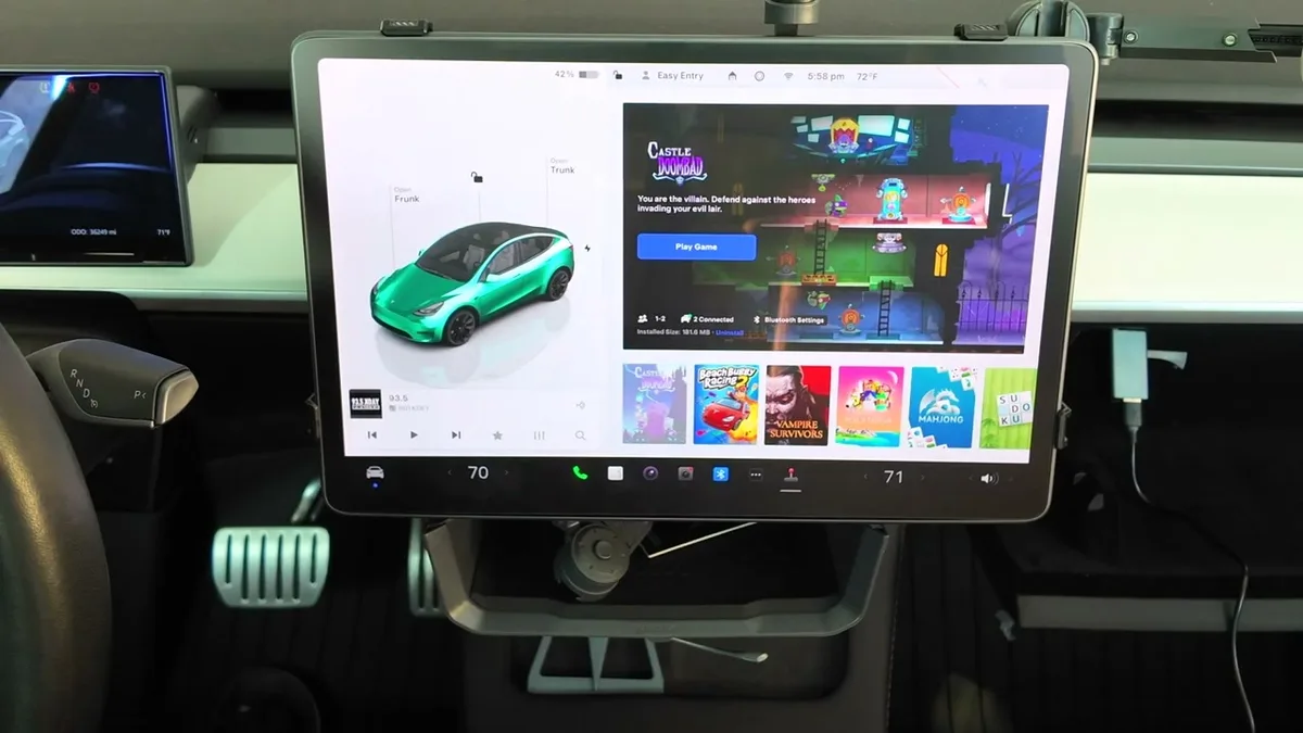 Tesla touchscreen showing Castle Doombad game page with 2 Connected controllers confirmed and Play Game button