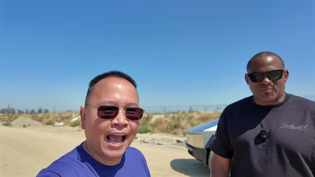 Sherwin and KobraToldYa together on a dirt road with the Cybertruck