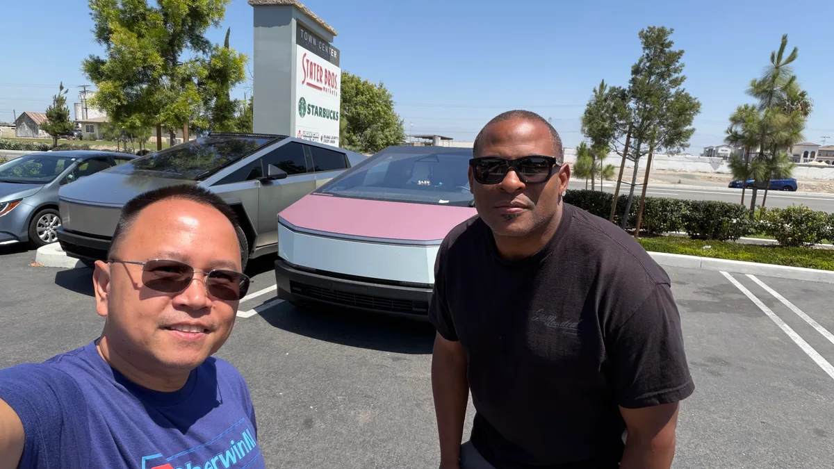 Sherwin and KobraToldYa selfie in front of both Cybertrucks at Stater Bros