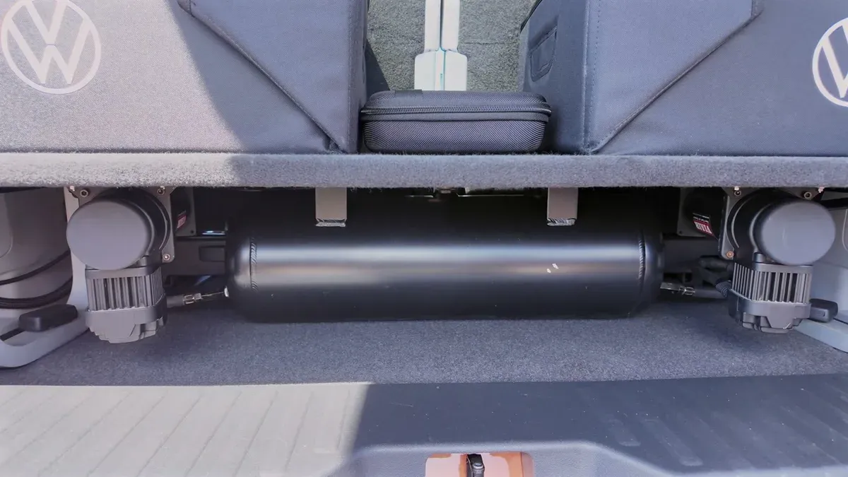 Custom air suspension tank and compressors in the rear of the VW ID. Buzz